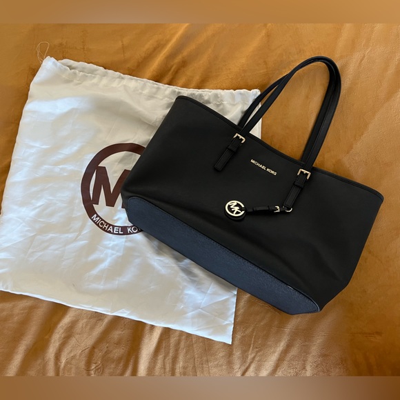 Michael Kors Handbags - Michael Kors Jet Set Travel Tote in black.